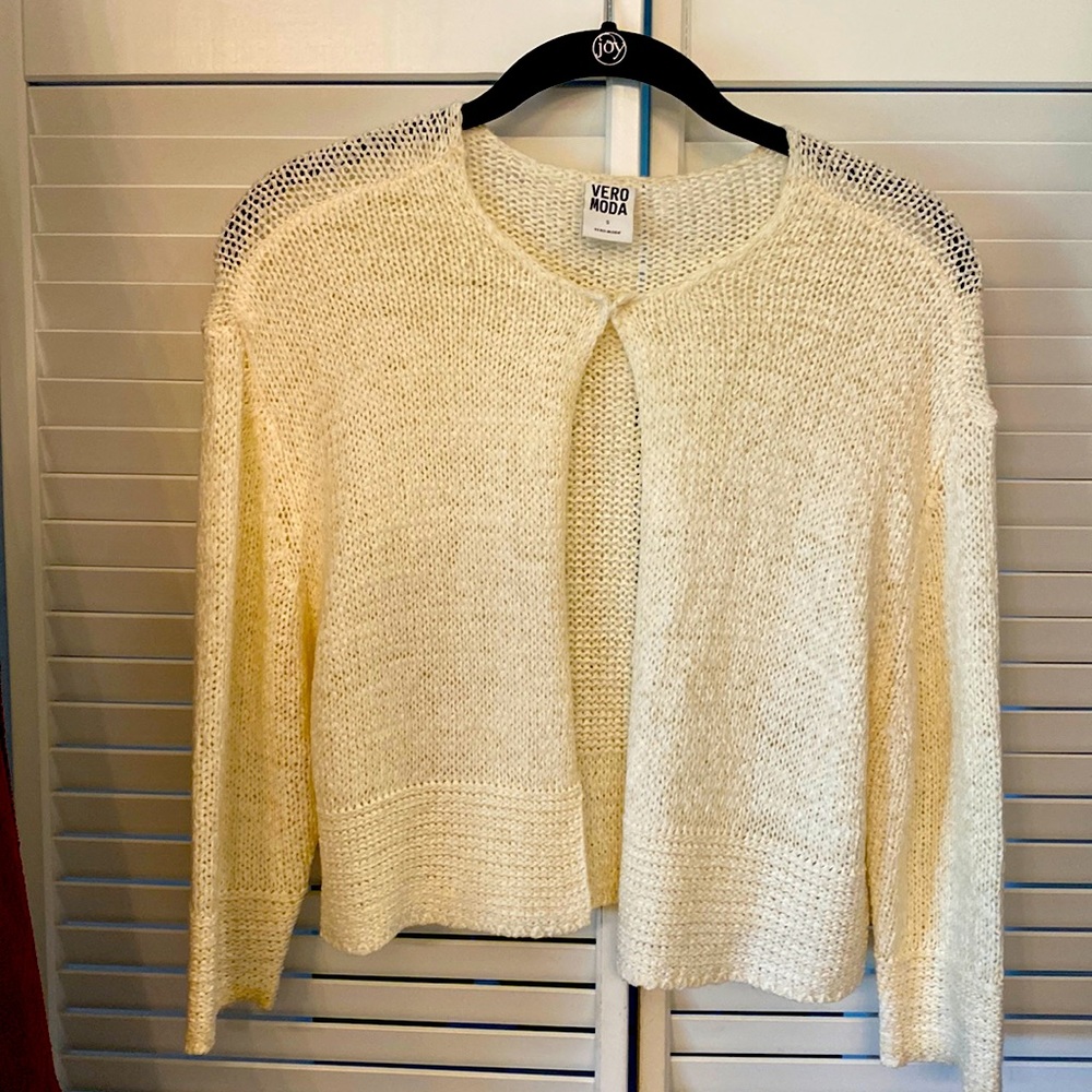 Two 3/4 sleeved knit tops. Black and Off White